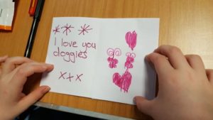 Note saying “I love you doggies”