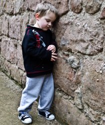 Boy against wall